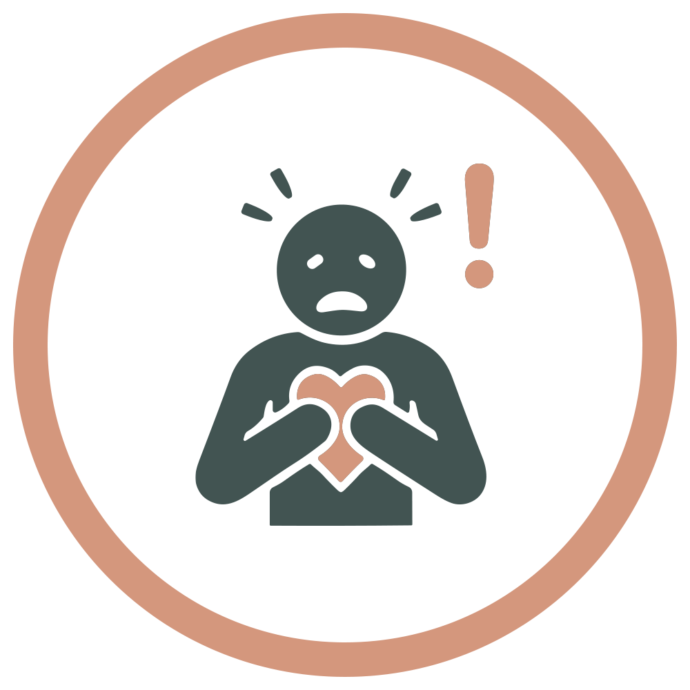 A sad figure holding a broken heart, with a distressed expression and an exclamation mark above its head, surrounded by a pinkish circular border.