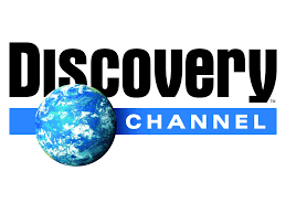 Discovery Channel logo with the word 'Discovery' in black text, a globe icon, and a blue rectangle with white text 'Channel'