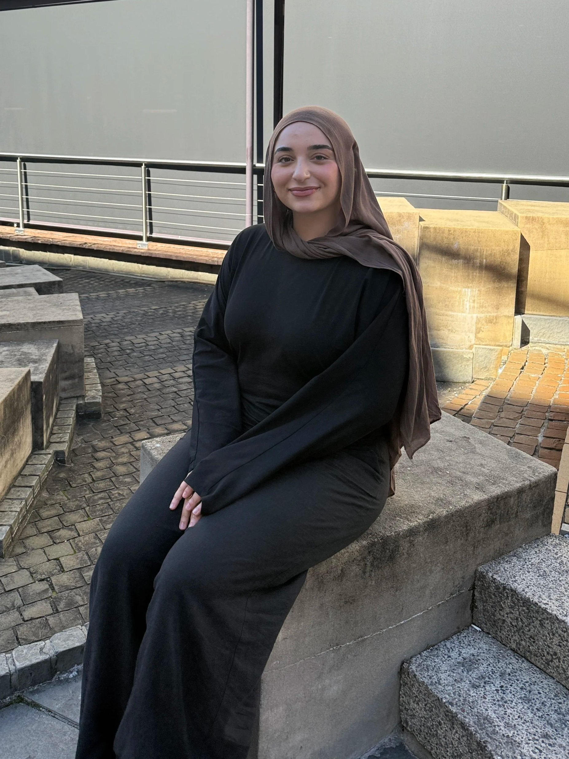 Woman sitting smiling