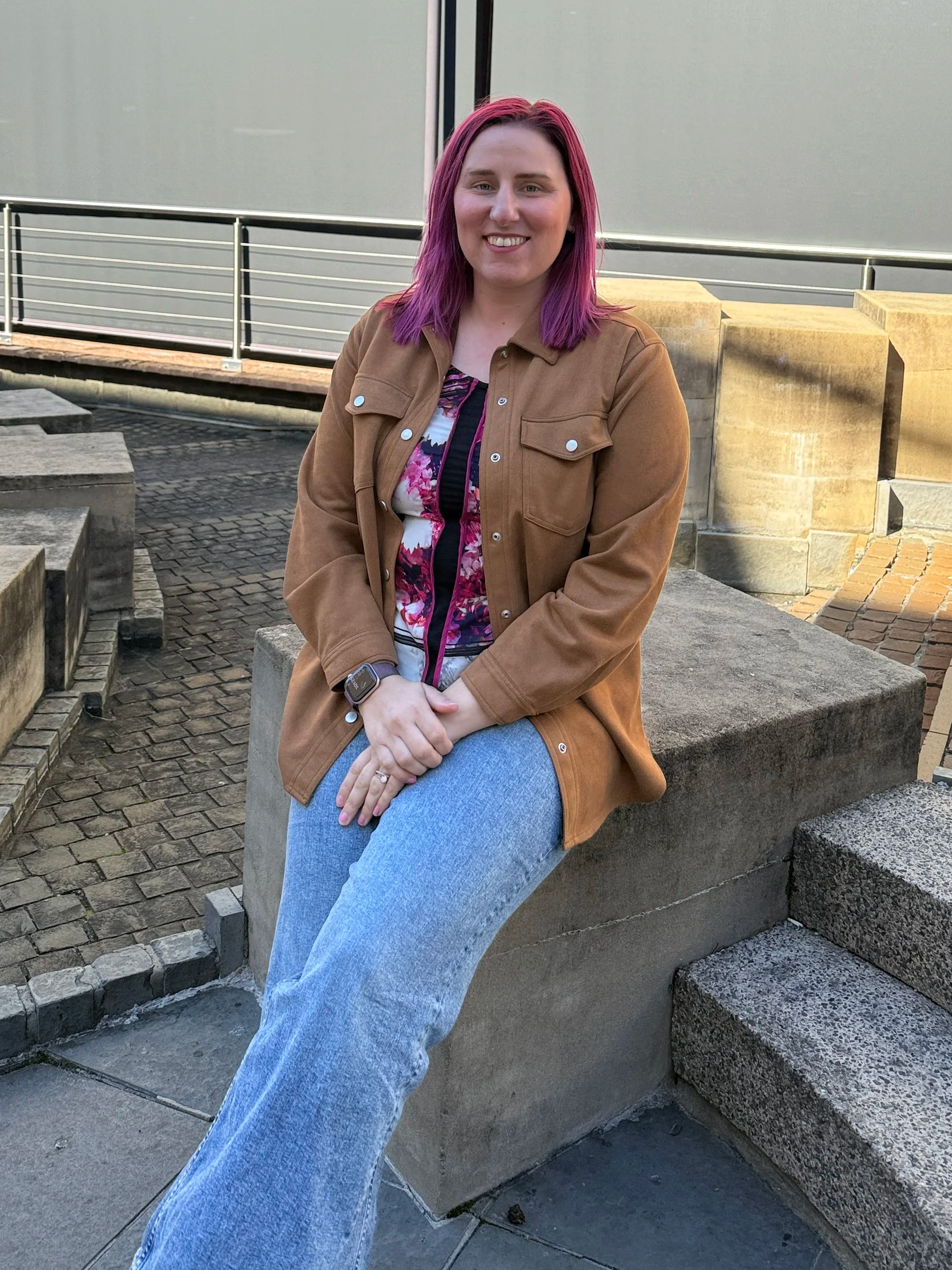 Woman sitting smiling
