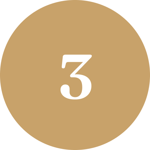 A gold circle with a white number three in the center.