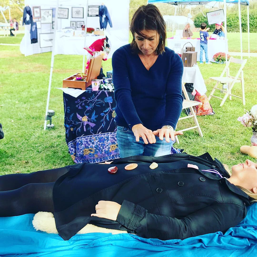 Client holding a natal chart