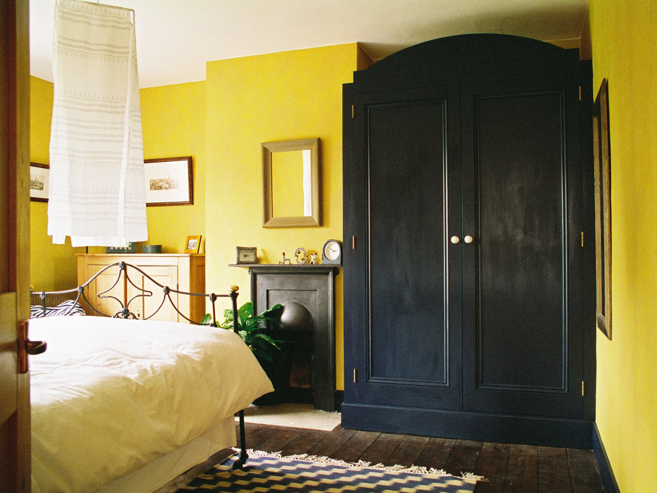 Bespoke, Dark Blue painted built-in wardrobe.