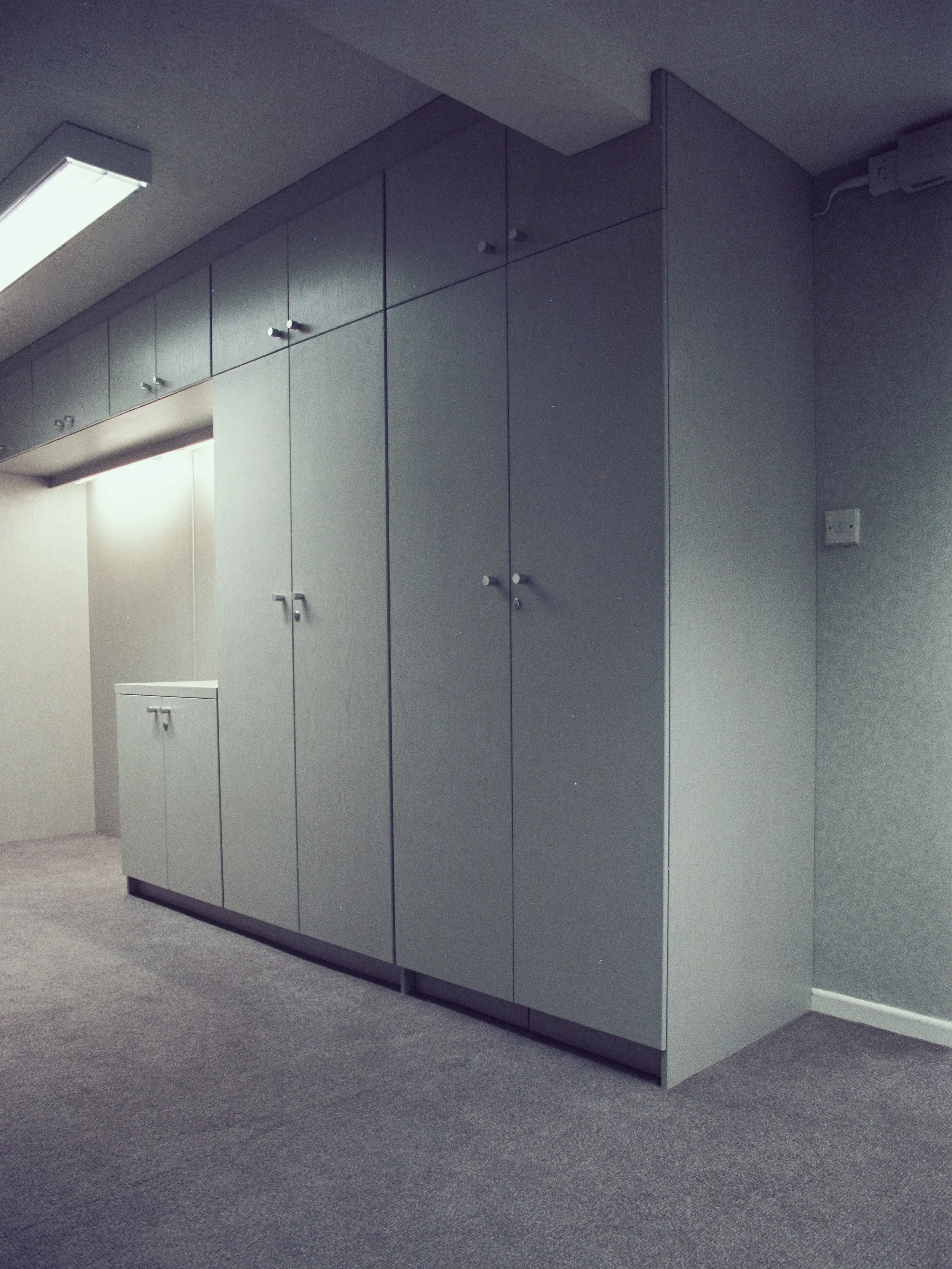 Grey lacquered Ash office storage system.