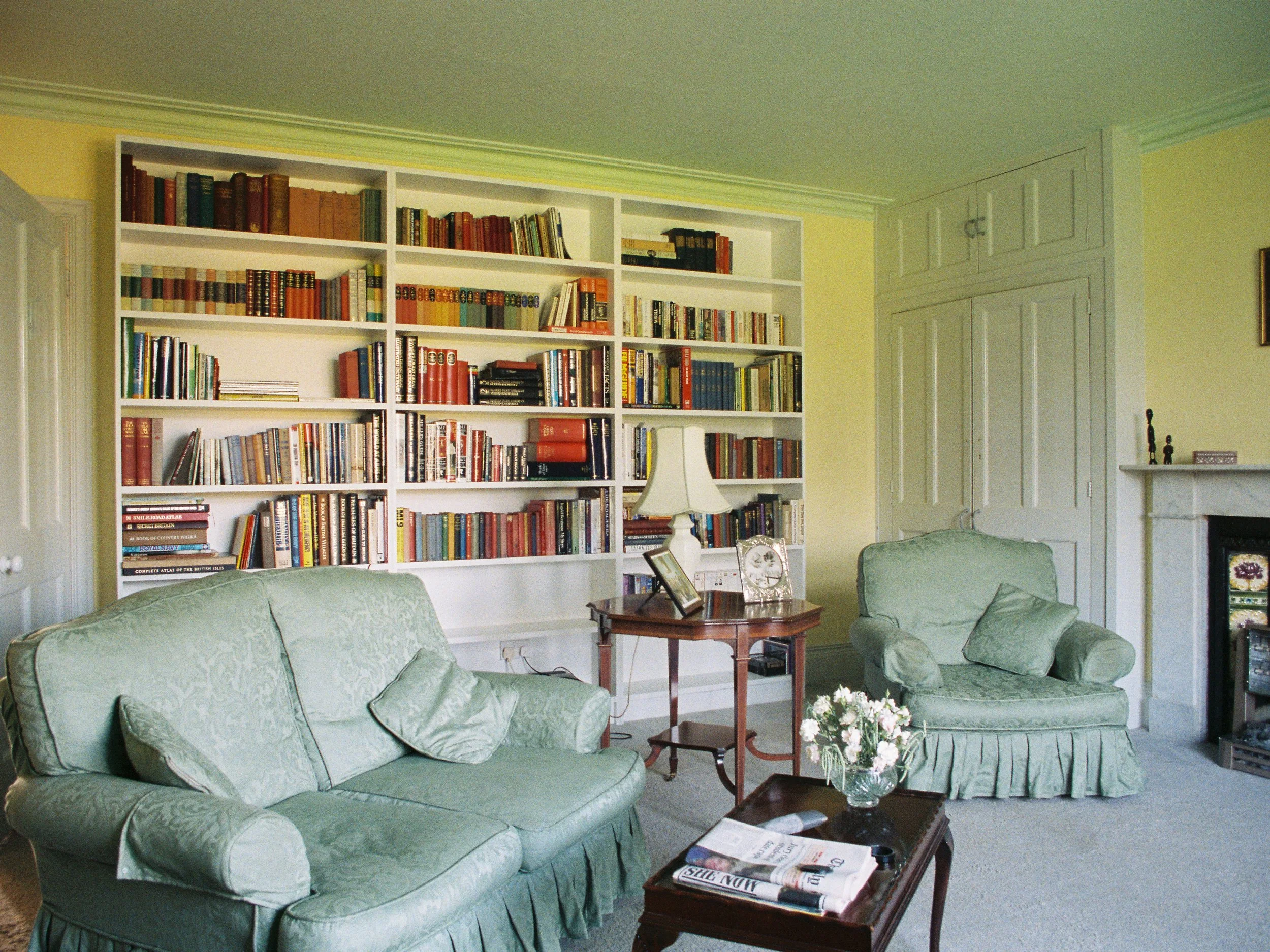 Large, White painted bookshelf.