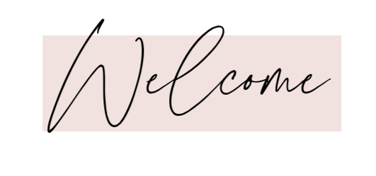 A sign with the word "Welcome" written in elegant cursive font on a light pink background.