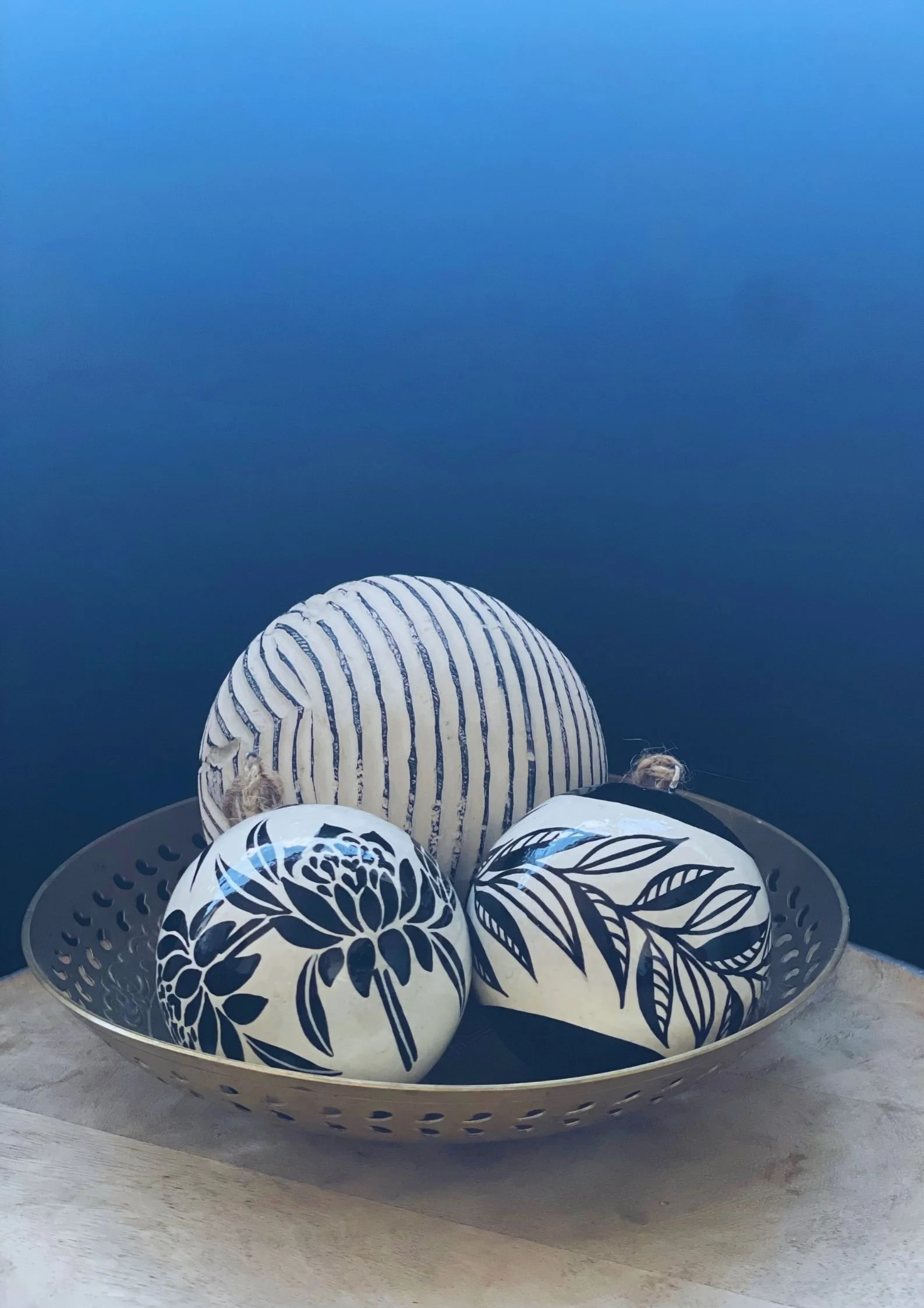 Hand-painted floral Christmas baubles from Janos Fernando Home