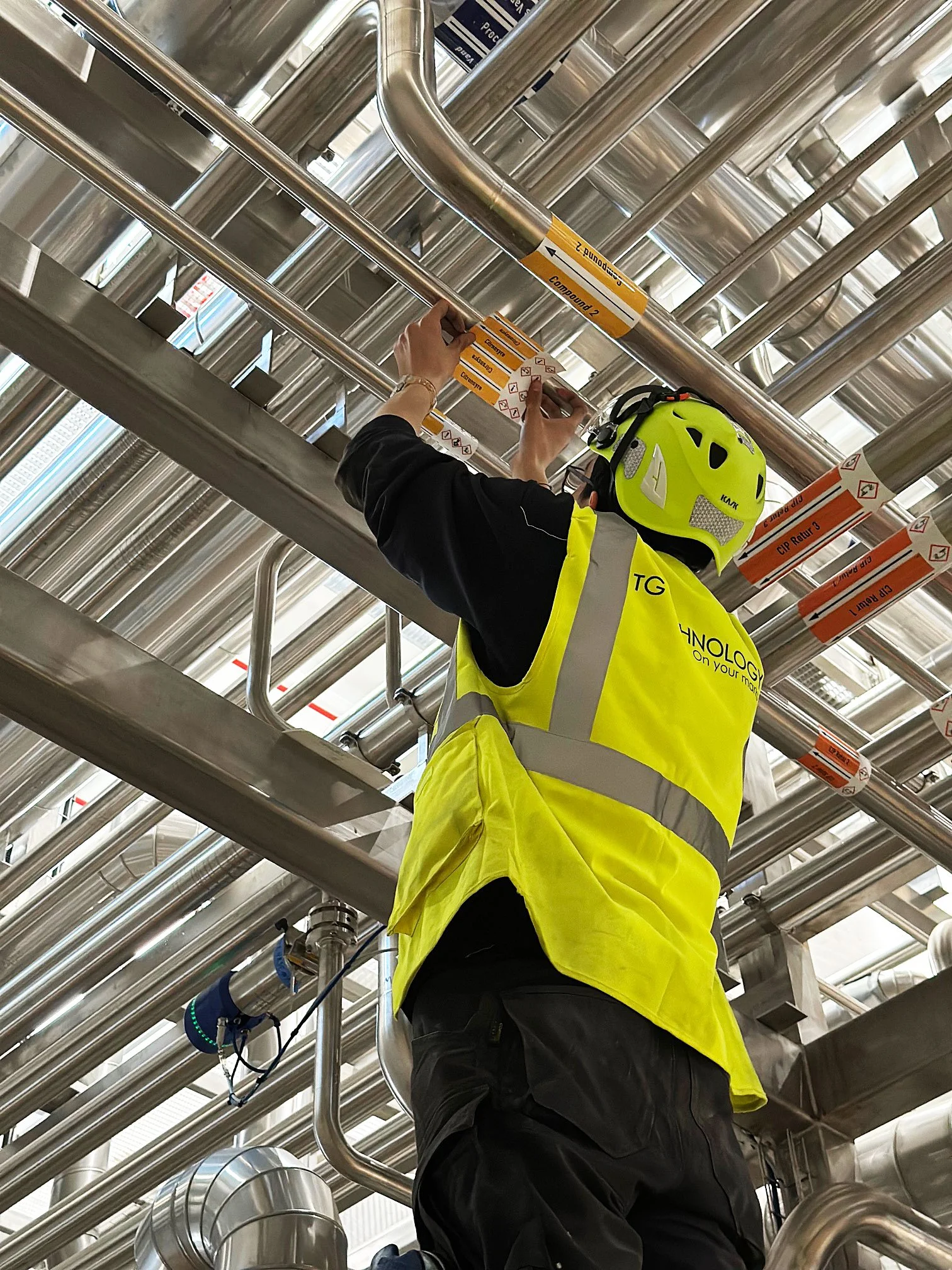 Industrial marking during installation at a process plant, focusing on correct identification, documentation and operational safety.