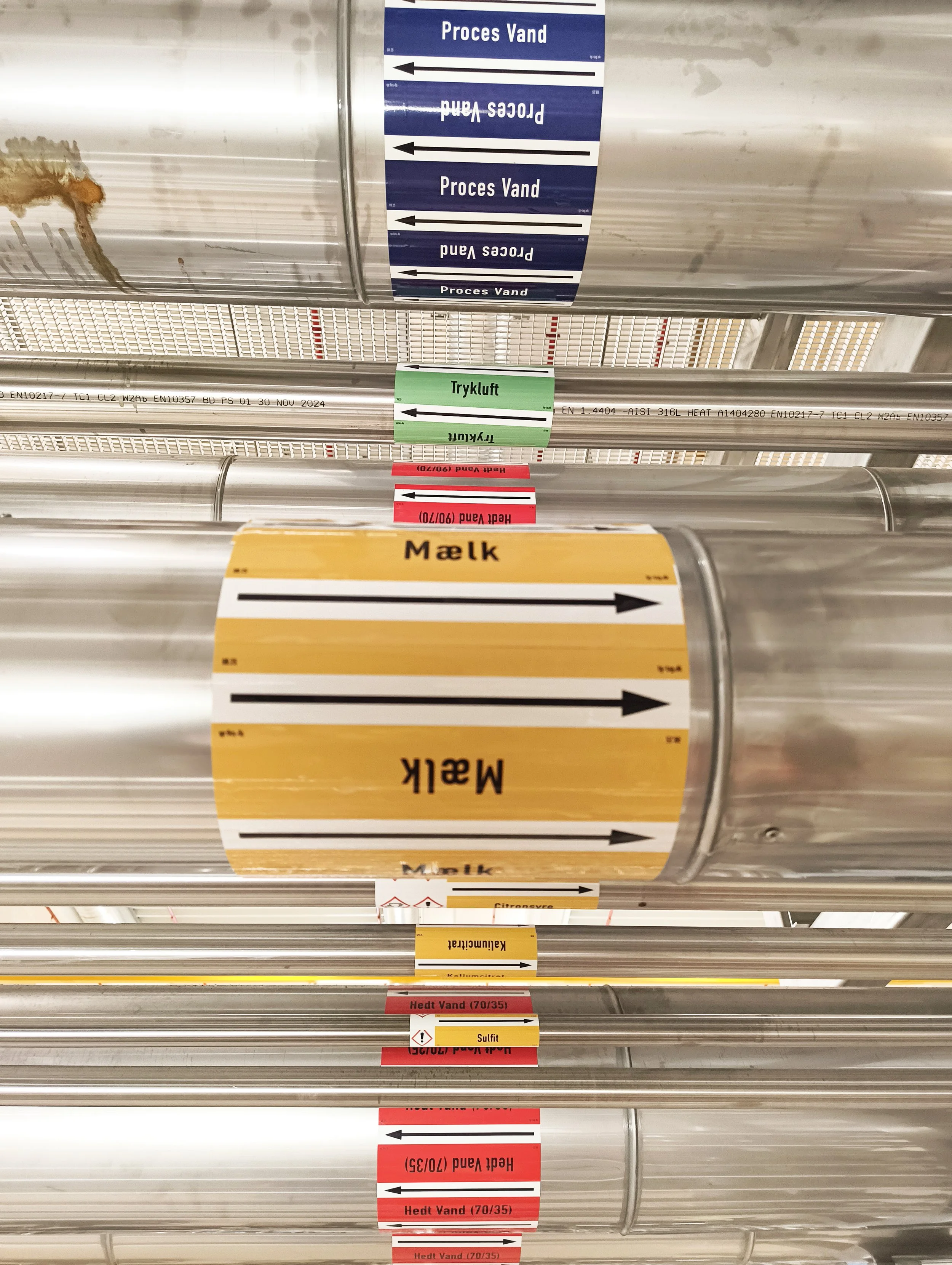 FLOWMARK pipe marking installed on industrial piping systems