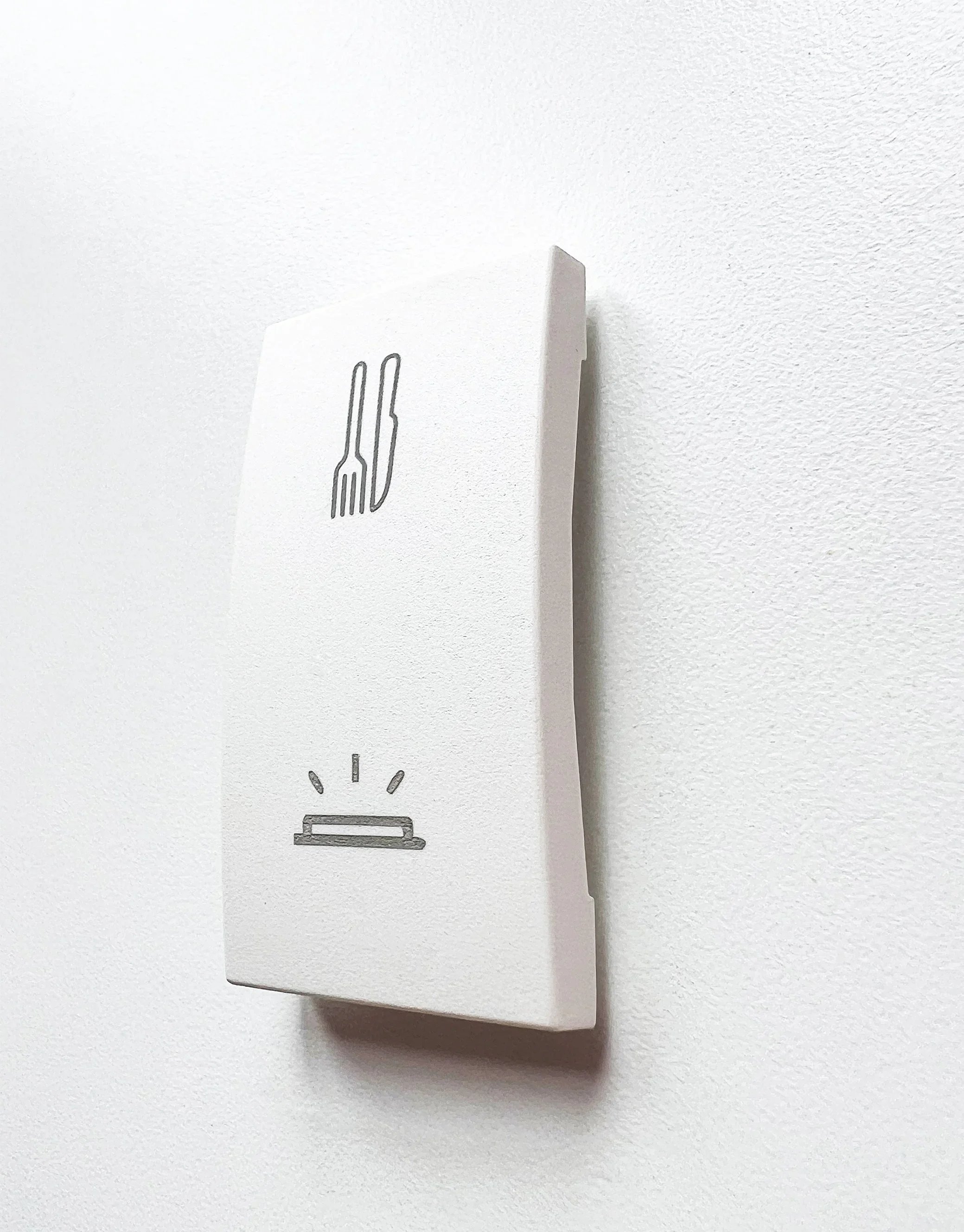 Engraved buttons and switches with custom icons for industrial control panels