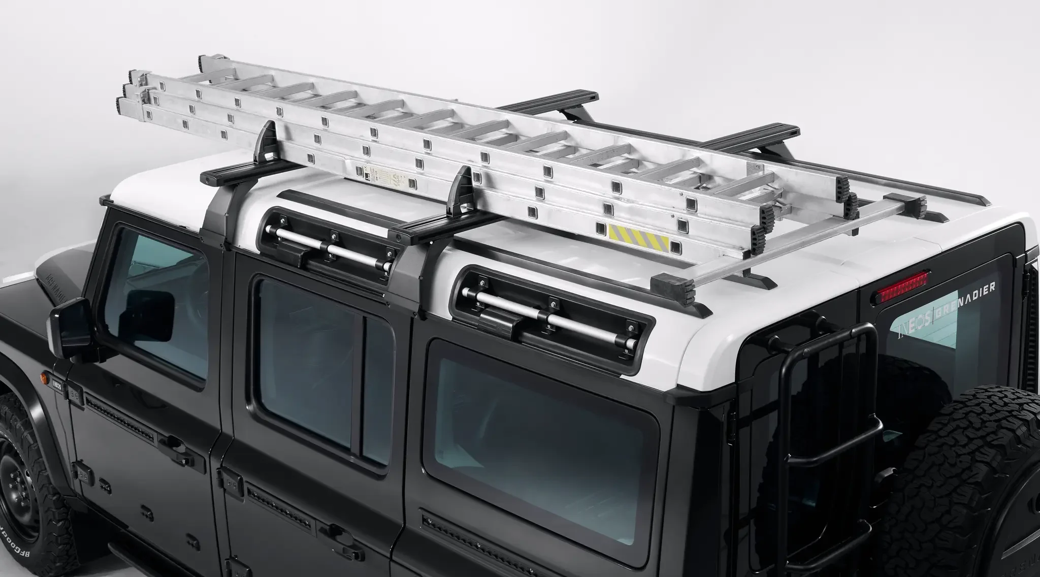 Adjustable Load Holder

Ladders, scaffolding. Throw it all up top, it’ll hold.