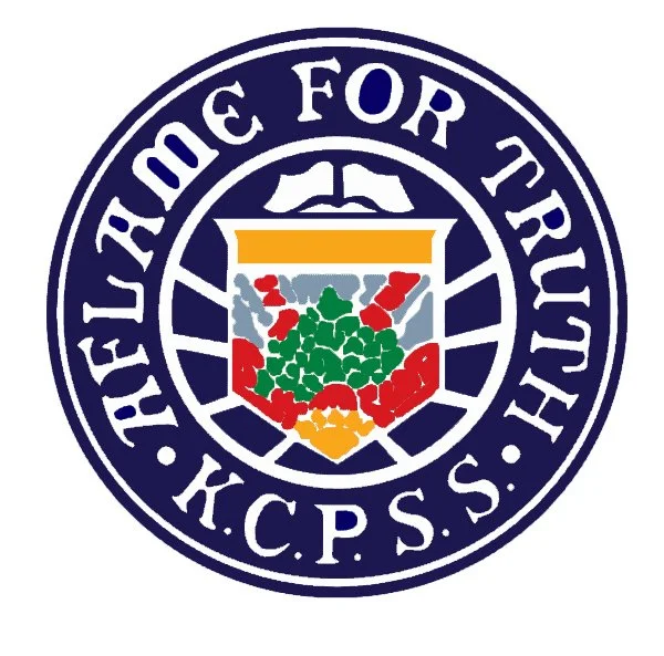 Logo of the United States Marine Corps with the text "Supporting Our Troops" and the acronym "K.C.P.S." surrounding a shield emblem.