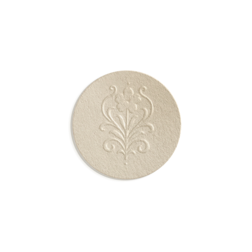 Tabla de una pastilla blanda con símbolo en relieve