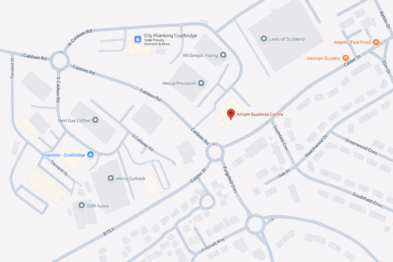 Map showing streets and locations around Atrium Business Centre in Coatbridge, including Caldeen Road, Southfield Crescent, Greenwod Crescent, Oak Place, and nearby businesses like Next Day Coffee, Howell's Coatbridge, Henry Colbeck, EGR Autos, and City Plumbing Coatbridge.