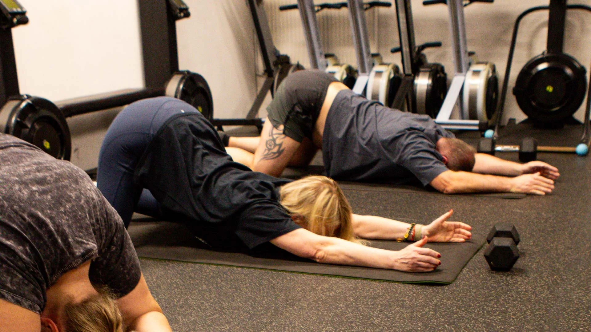 Members stretching during a BUILT Training FLOW class