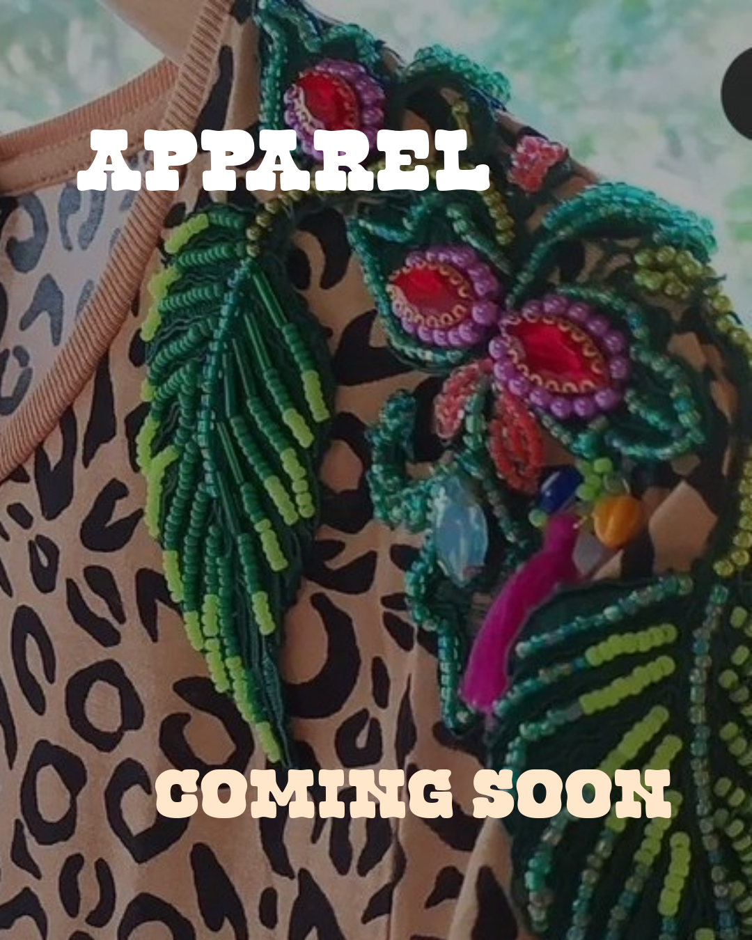 Colorful beaded accessories with a leopard print background. Text overlay: 'Apparel Coming Soon'.
