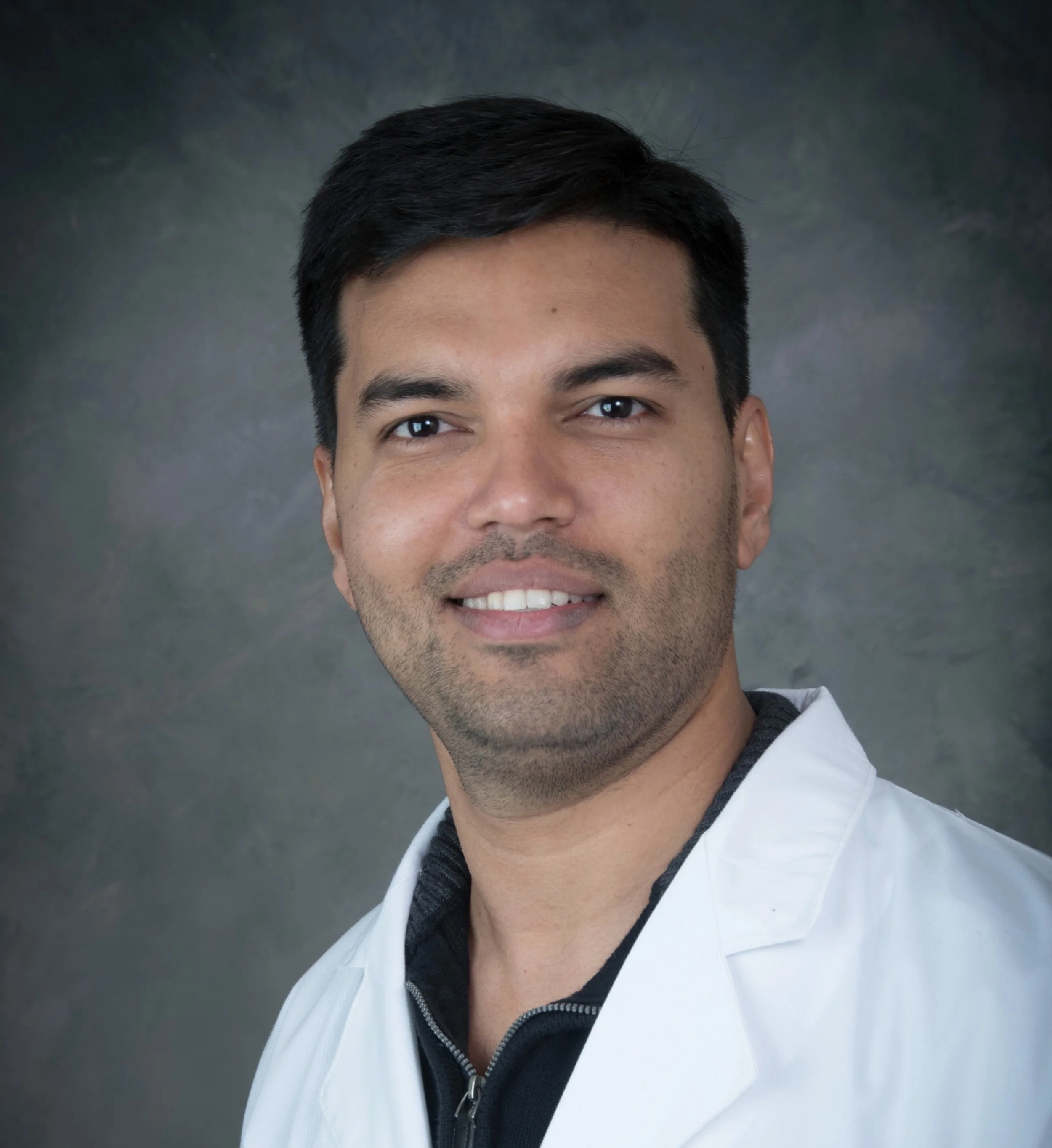 Dr. Sunil Bochare, board-certified pediatrician and founder of 210 Pediatrics.