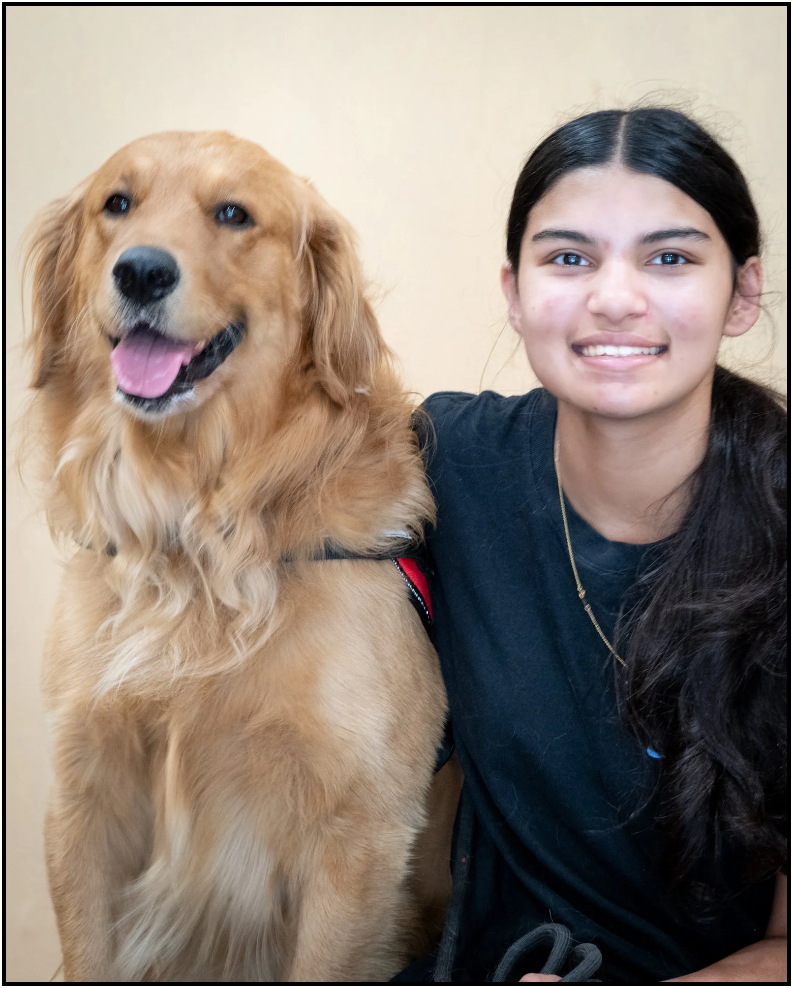 Child with Luke, the Golden Retriever, at 210 Pediatrics, a board-certified pediatric telemedicine practice serving families across Texas and Florida.