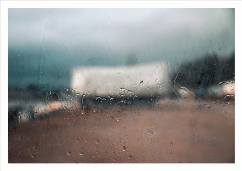 Behind the rain