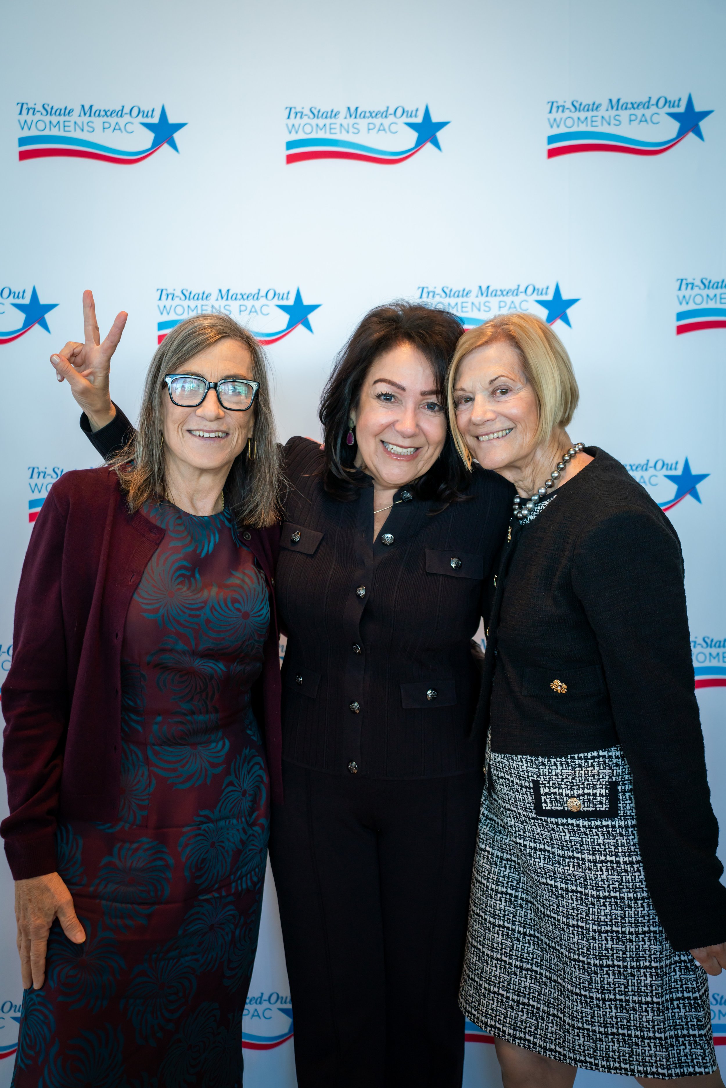 Three women posing together at the 2025 Tri-State Maxed-Out Womens PAC Annual Luncheon.