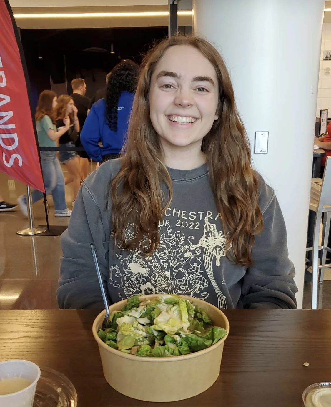 Sarah with a vegan salad