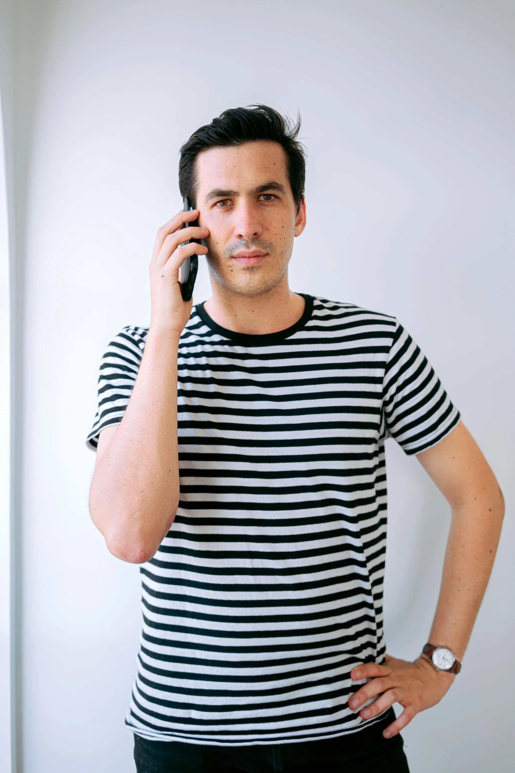 Business owner making a phone call on his mobile phone