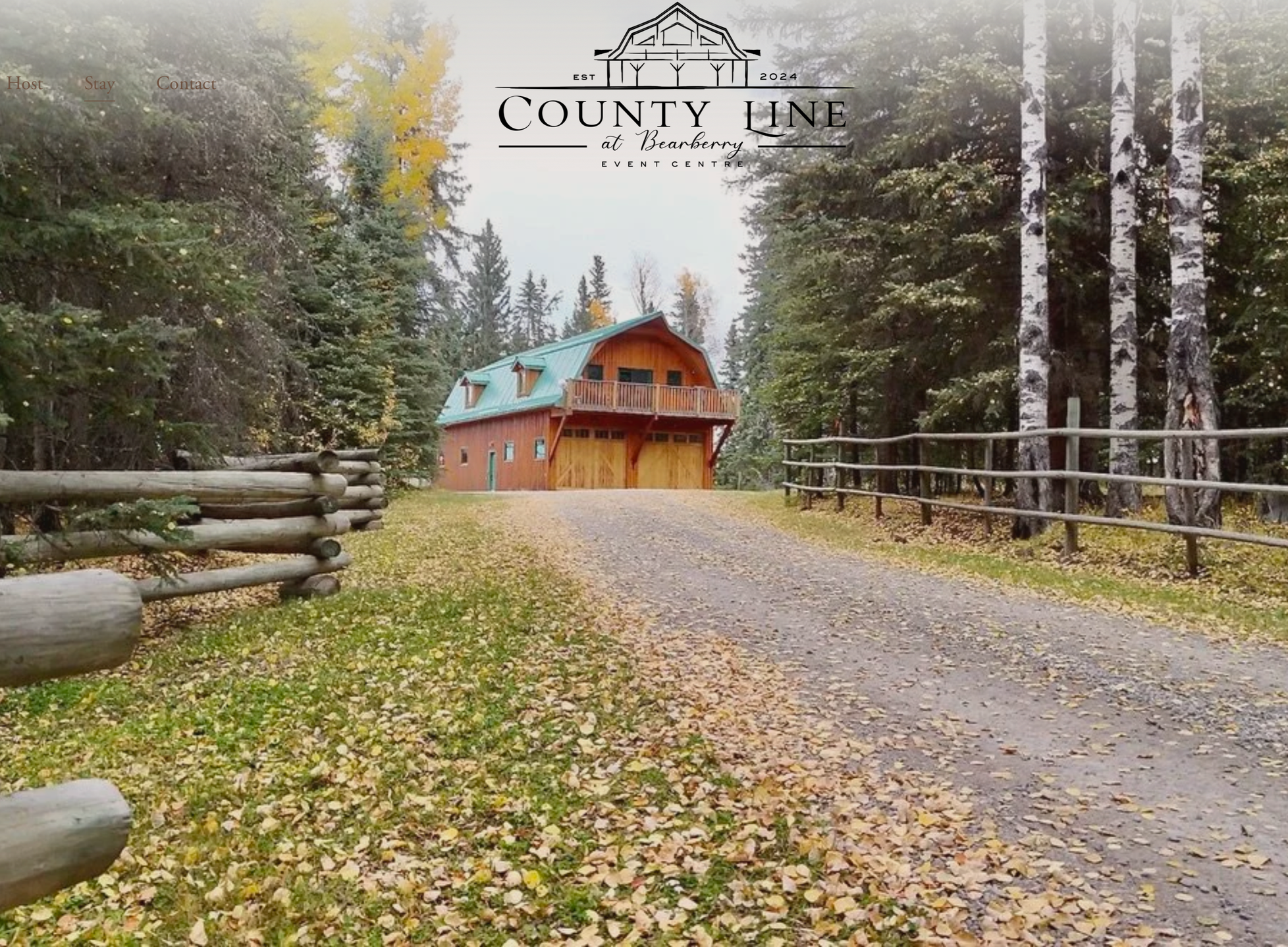 Tree-lined entrance to The County Line at Bearberry event venue in rural Alberta.