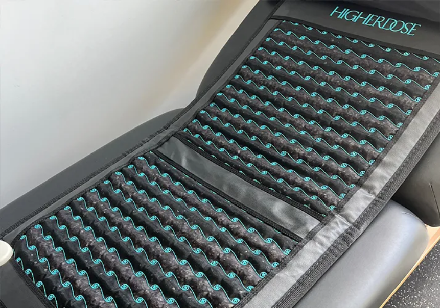 Pulsed electromagnetic field mat used as part of the NeroReset multi-sensory wellness experience.