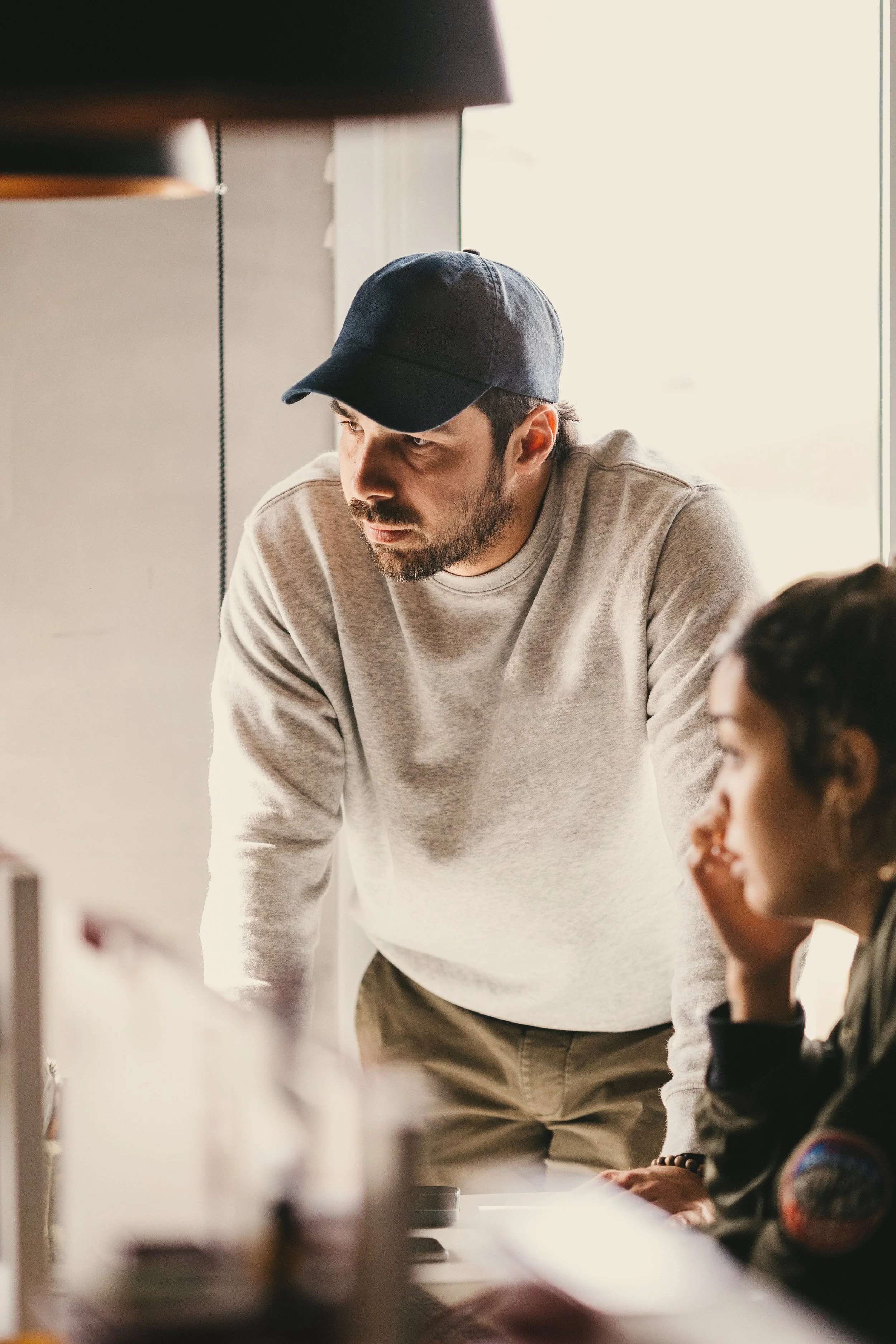 A manager having a supportive one-on-one conversation with an employee