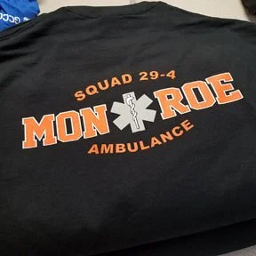 Custom screen printed apparel created by Public Safety Outfitters for organizations, teams, and businesses.