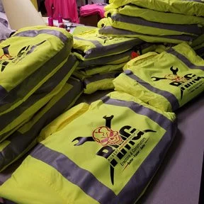 Custom screen printed workwear and branded apparel created by Public Safety Outfitters for businesses and organizations.