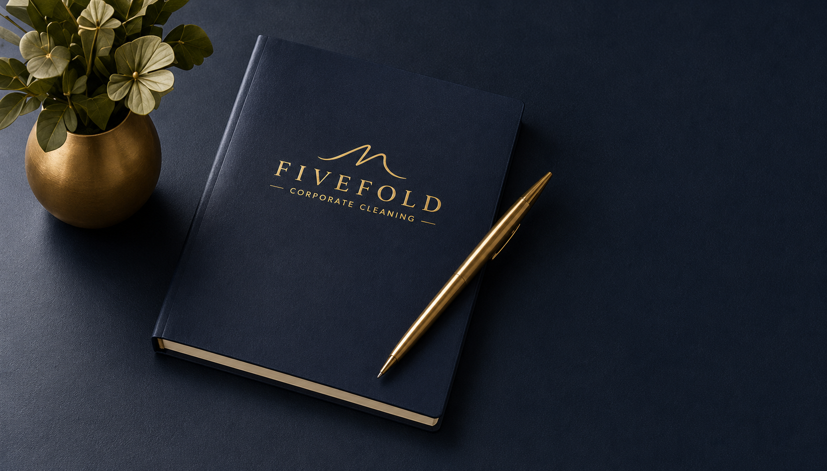Fivefold Corporate Cleaning branded notebook with gold pen.