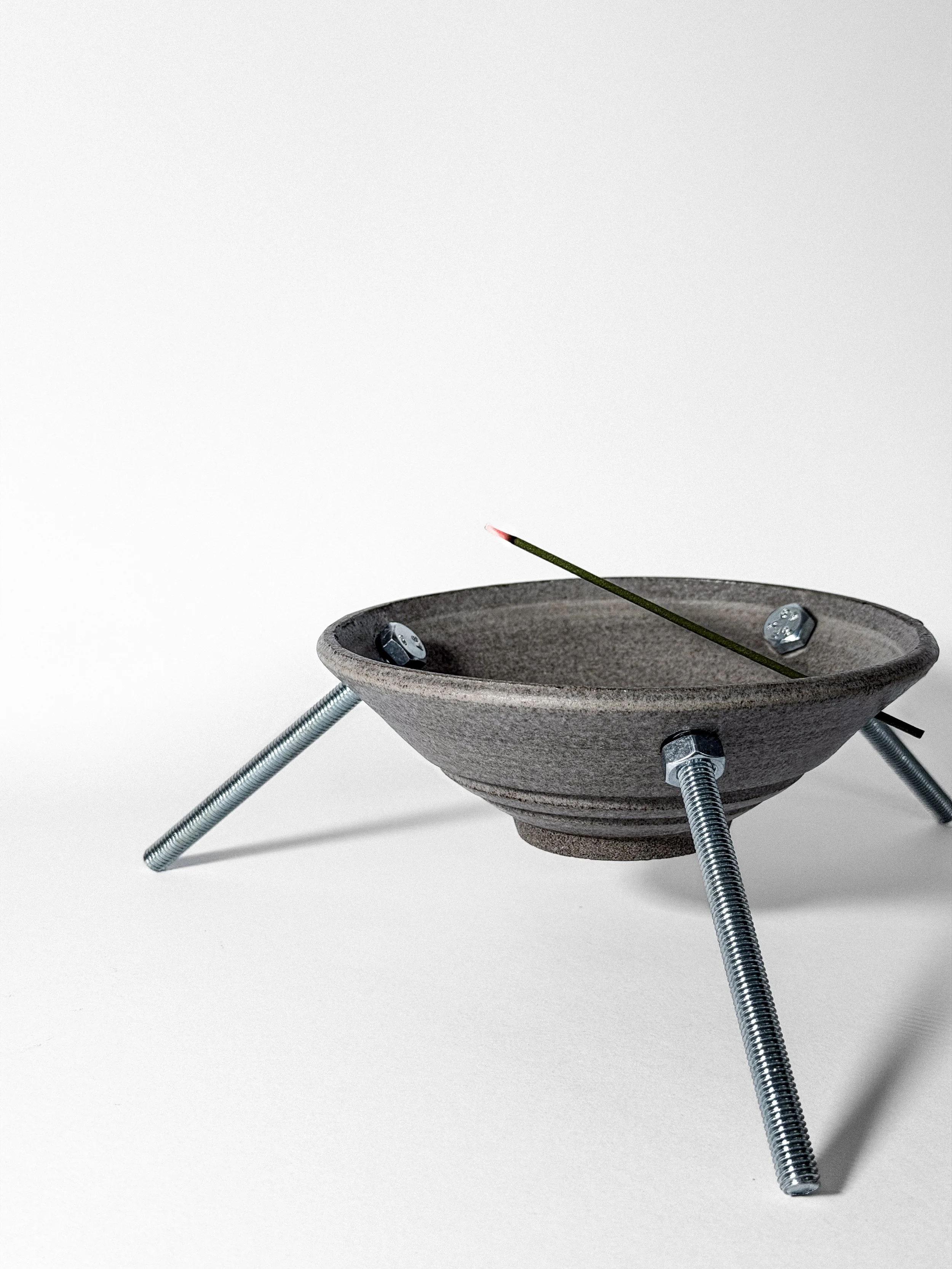 brutalist ritual 01 incense holder with incense stick, threaded rod legs and hex nuts