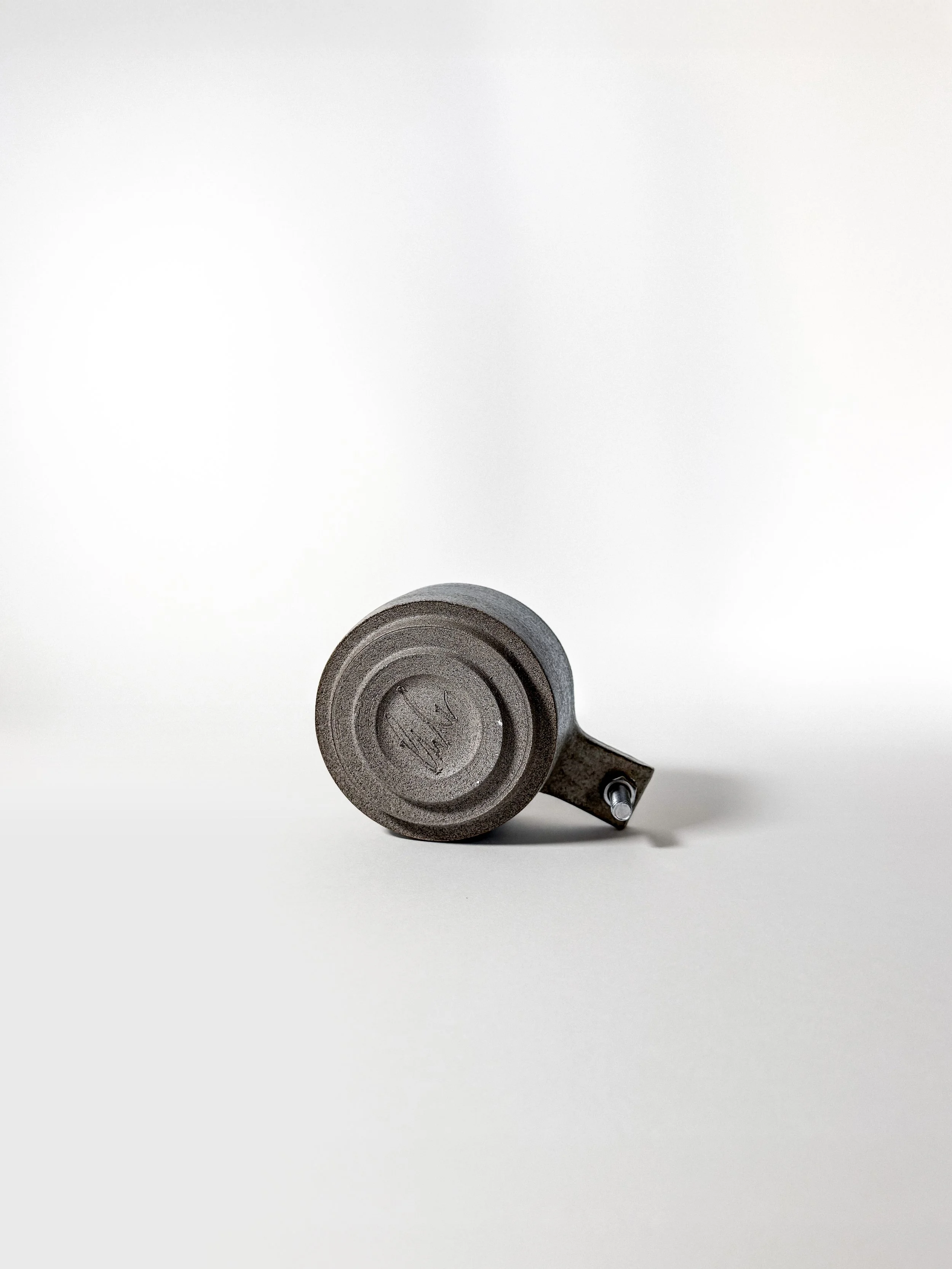 brutalist cup 01 classic underside showing the wheel-thrown foot and hex-bolt handle
