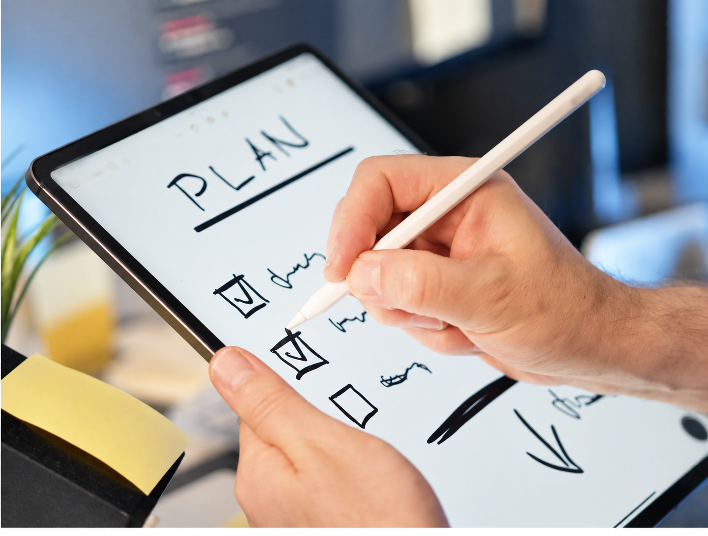 Person using a stylus to check off tasks in a handwritten project plan on a tablet.