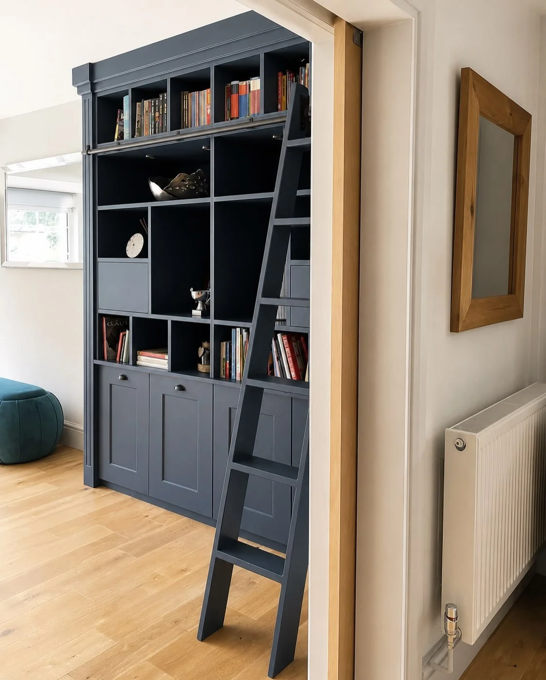 Have a closer look&hellip;

Every detail was designed to combine practical storage with timeless design, from the sliding ladder and integrated lighting to the hidden filing drawer and pull out printer below. 

#DigsAndDovetail #BespokeFurniture #Boo