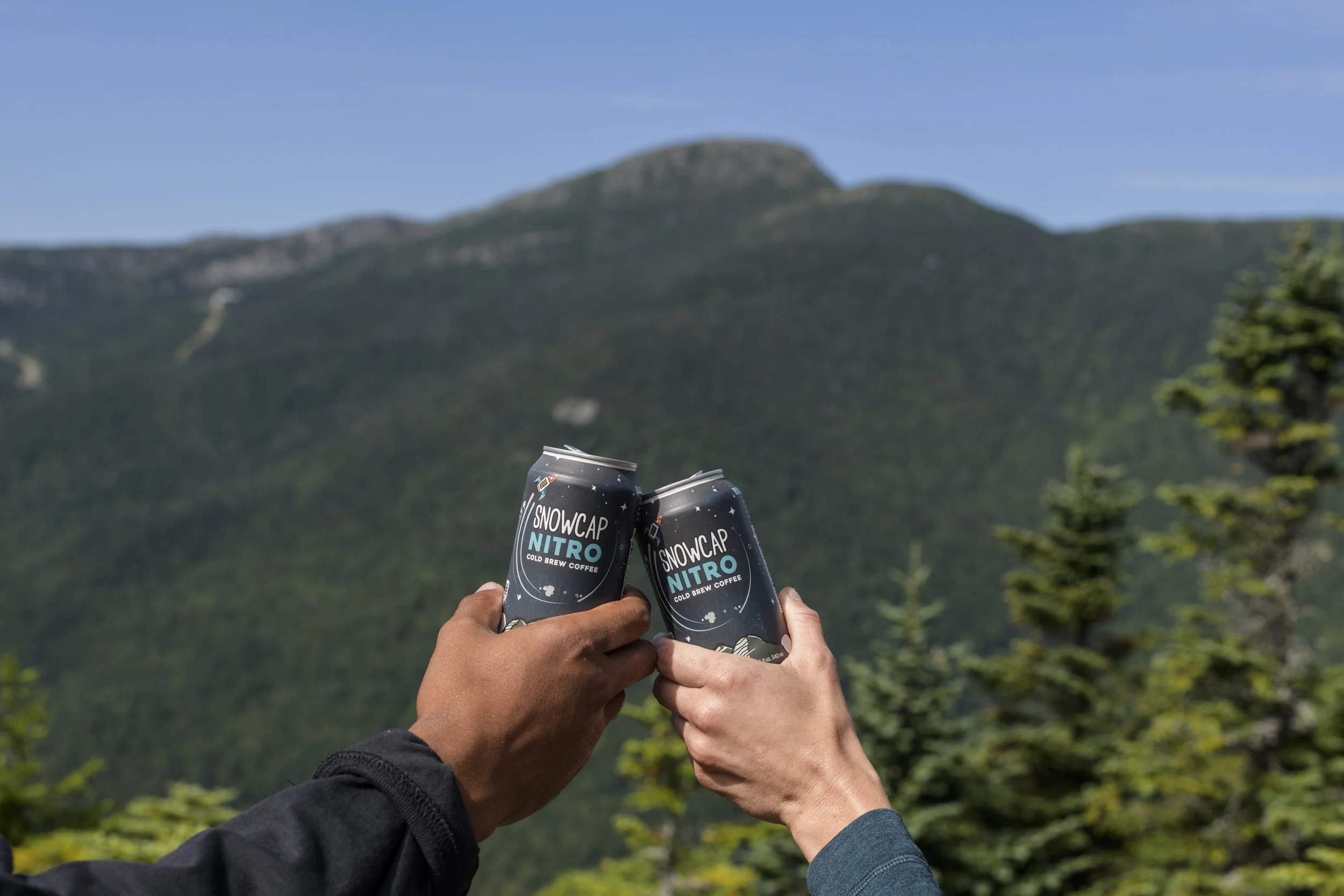 Nitro Cold Brew with Camel's Hump Mountain in the Distance