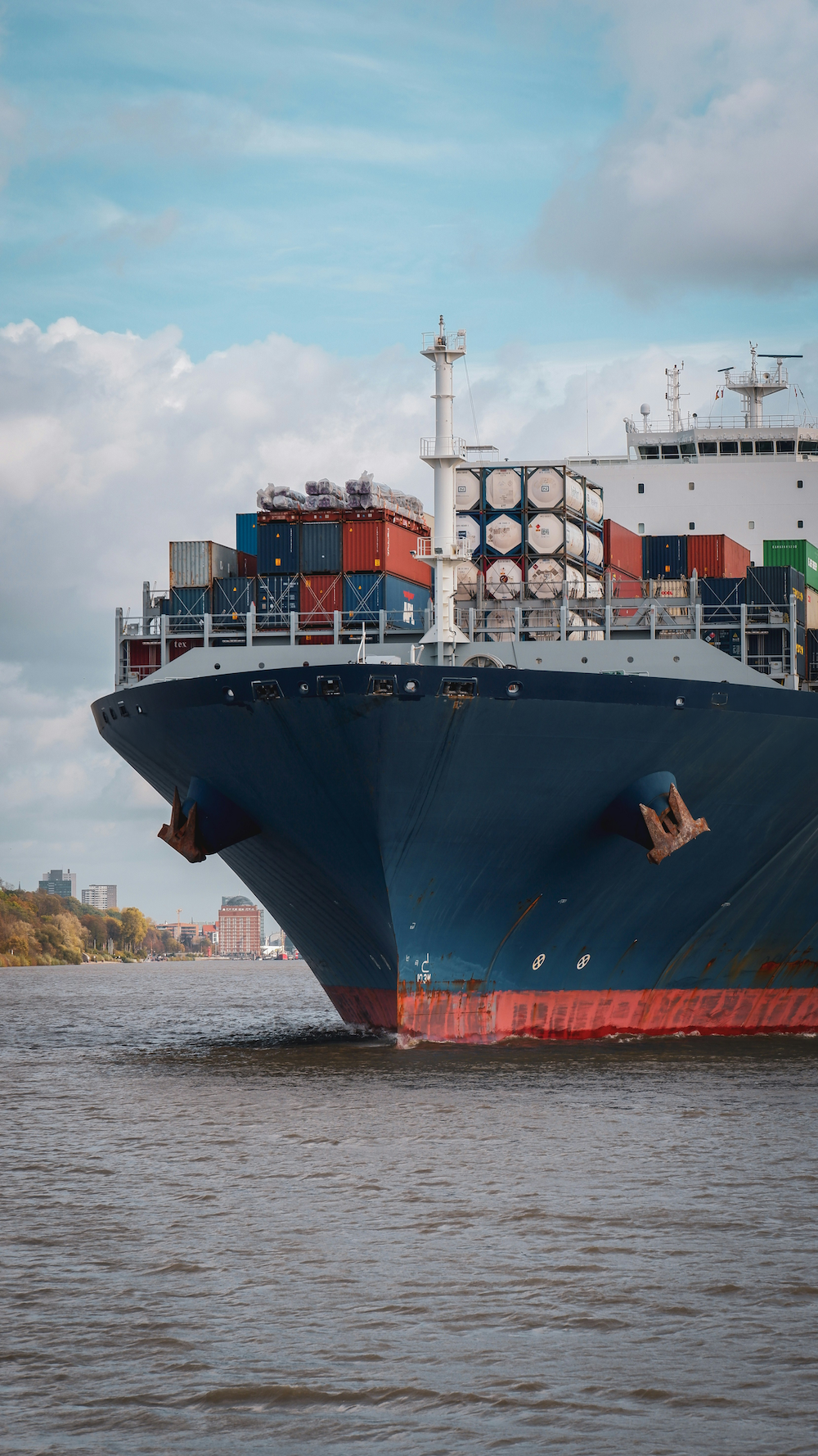 Container ship loaded with cargo at port