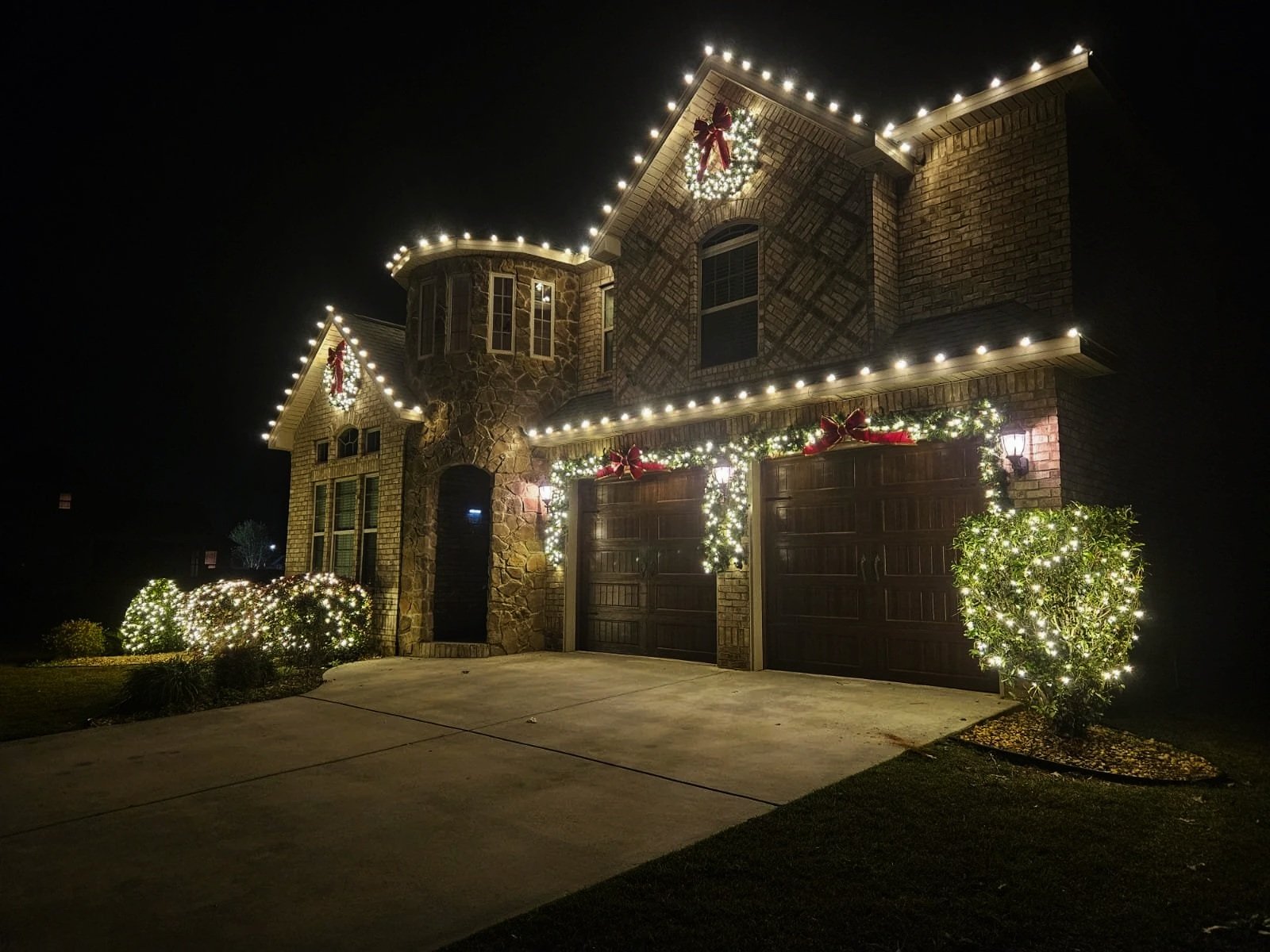 Flawless residential Christmas light installation with no dangling wires on a Lake Oconee property.