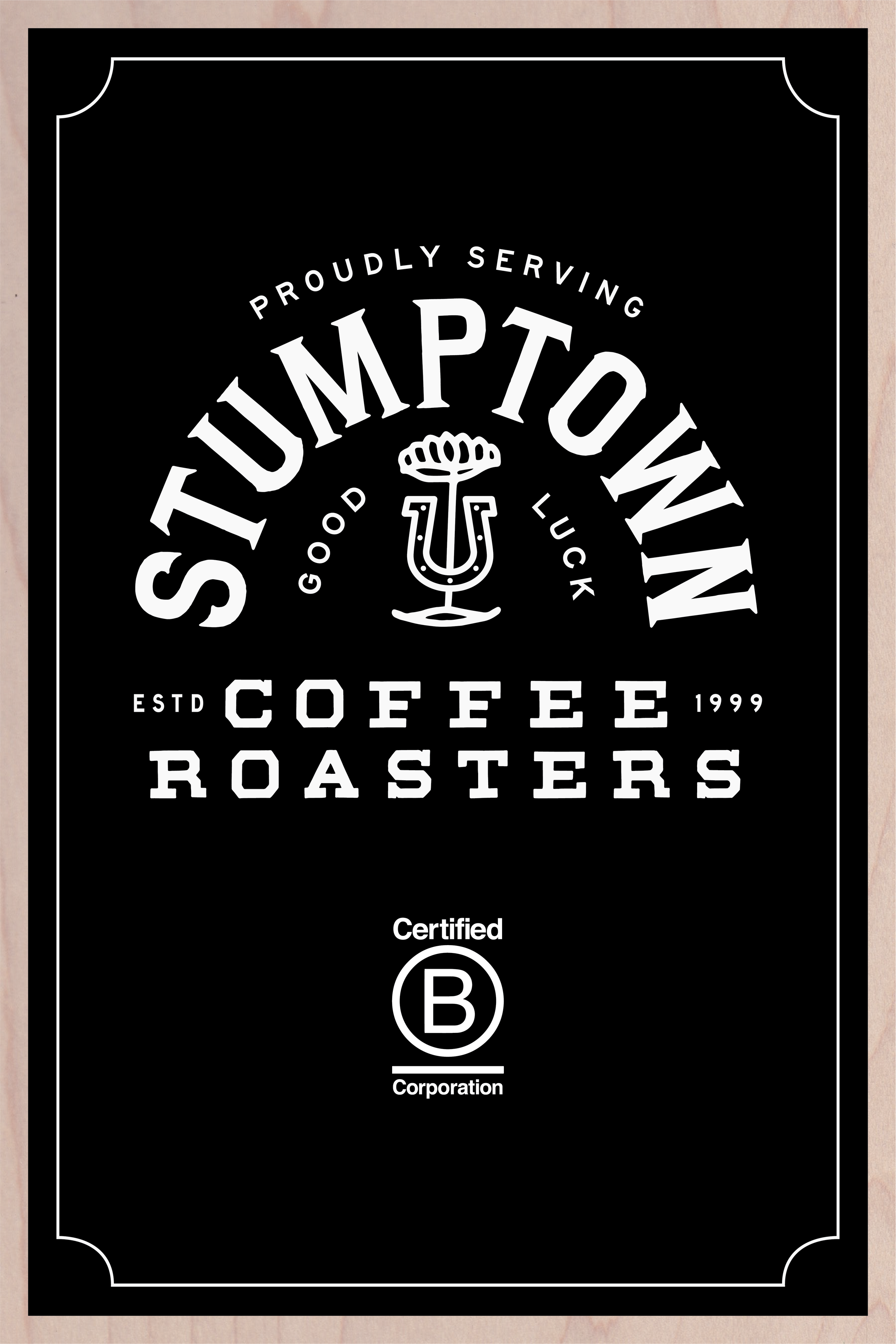 Black and white coffee roasters label with the text 'Proudly serving Tump Town', a coffee cup logo in the center, and the words 'Coffee Roasters' underneath. Additionally, there is a 'Certified B Corporation' logo at the bottom.