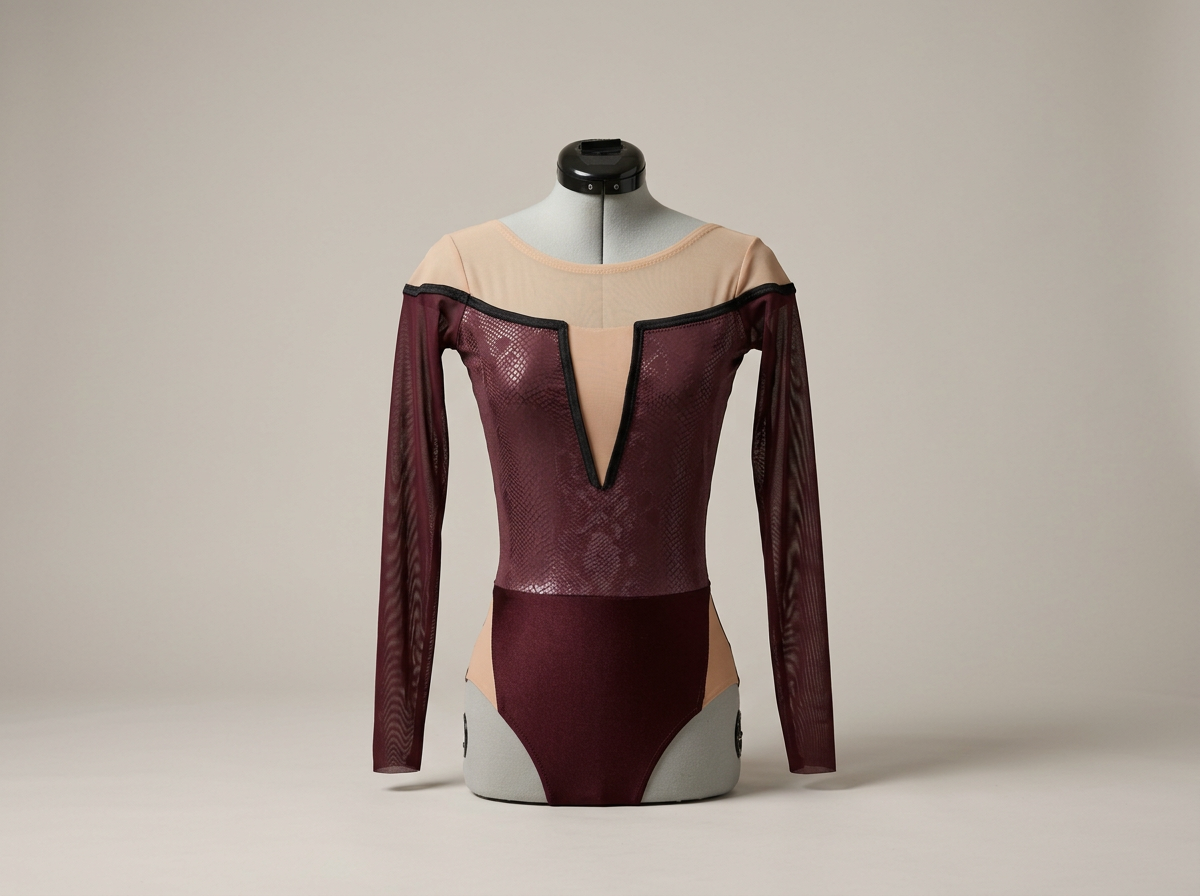 A mannequin wearing a long-sleeve, fitted bodysuit with sheer beige and burgundy sections and snake-skin pattern details, displayed against a plain light gray background.