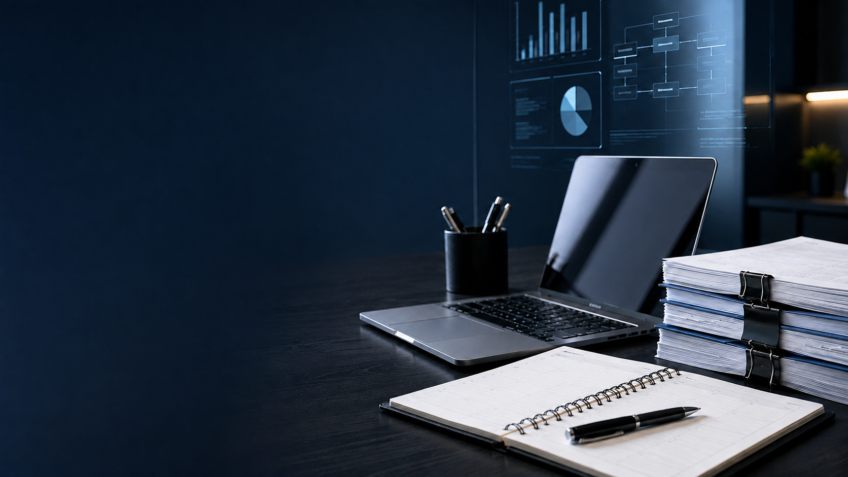 Organized government contract support workspace with laptop, calendar, and documents representing structured administrative operations.