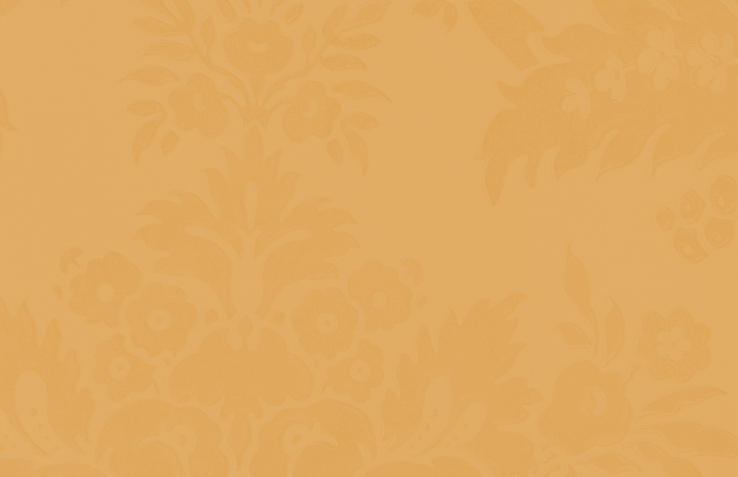 A bright orange background with a subtle floral pattern