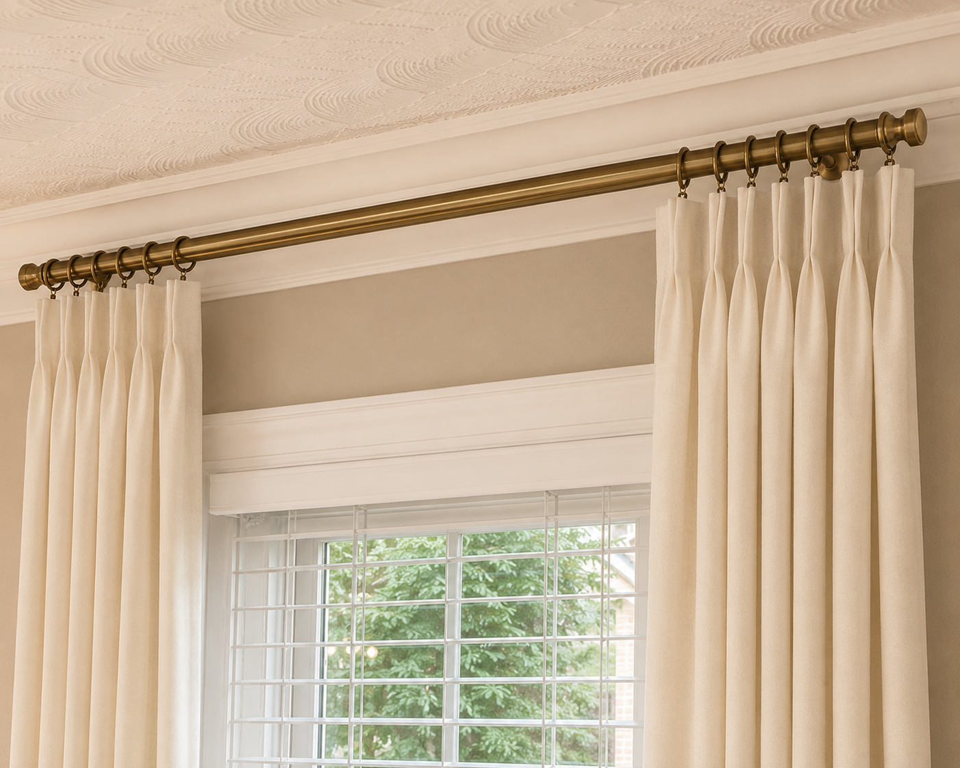 Antique Brass Drapery Rod,
I chose an antique brass finish to tie the window treatments into the other brass details throughout the dining room.
Shop the drapery rod →