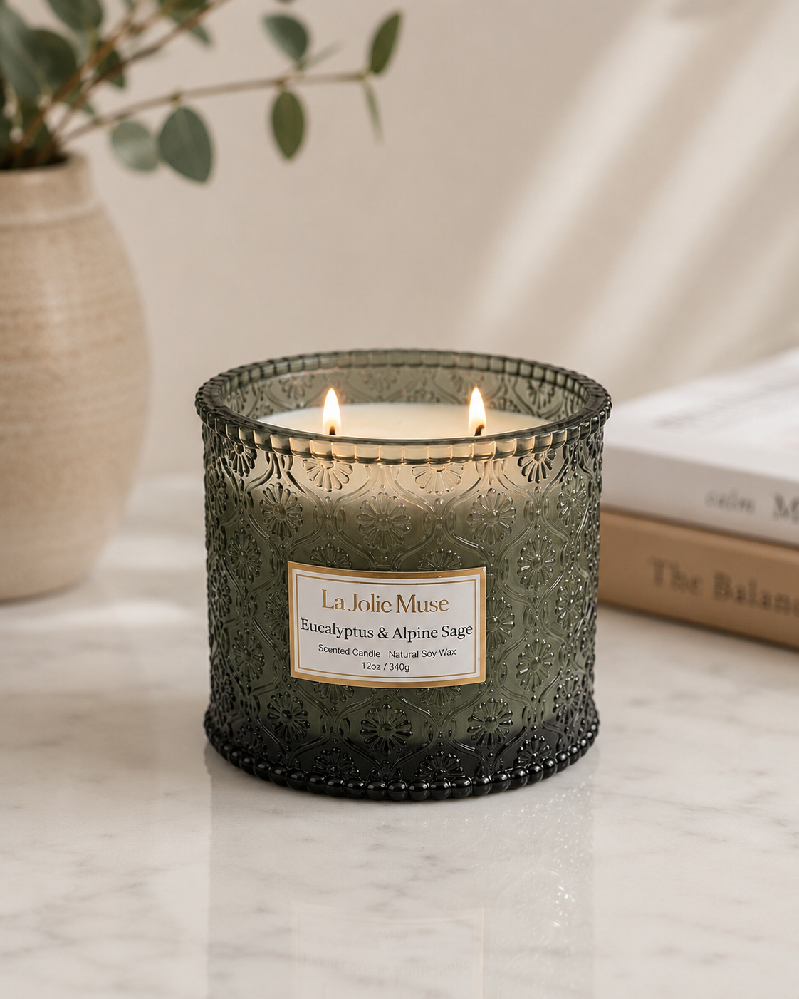 La Jolie Muse Two-Wick Soy Candle,
A textured glass candle that adds a small layer of color, pattern, and warmth to the room.
Shop the candle →