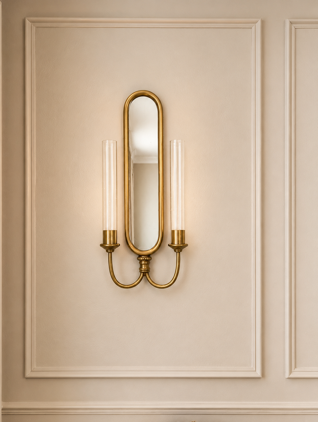 Parlor Mirrored Wall Sconce,
The Parlor Mirrored Wall Sconce from Ballard Designs adds warm brass and a traditional architectural detail to the room.
View the wall sconce →