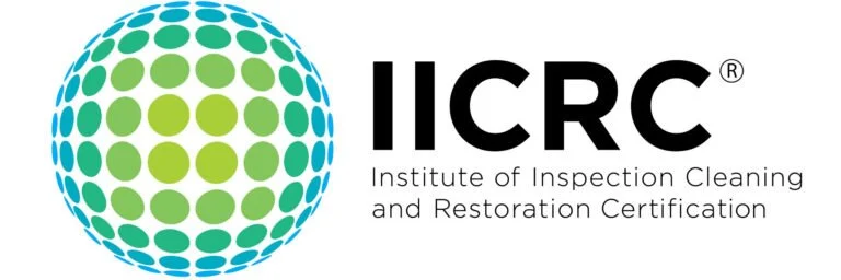 Logo of the Institute of Inspection Cleaning and Restoration Certification (IICRC), featuring a globe made of green and blue dots and the text IICRC with its full name below.