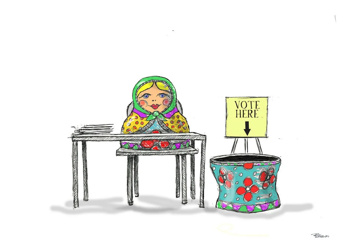 A hand-drawn illustration of a girl with blonde hair, wearing a green and purple headscarf, sitting at a voting booth with a sign that says "Vote Here" and an arrow pointing down to a ballot box decorated with colorful patterns.