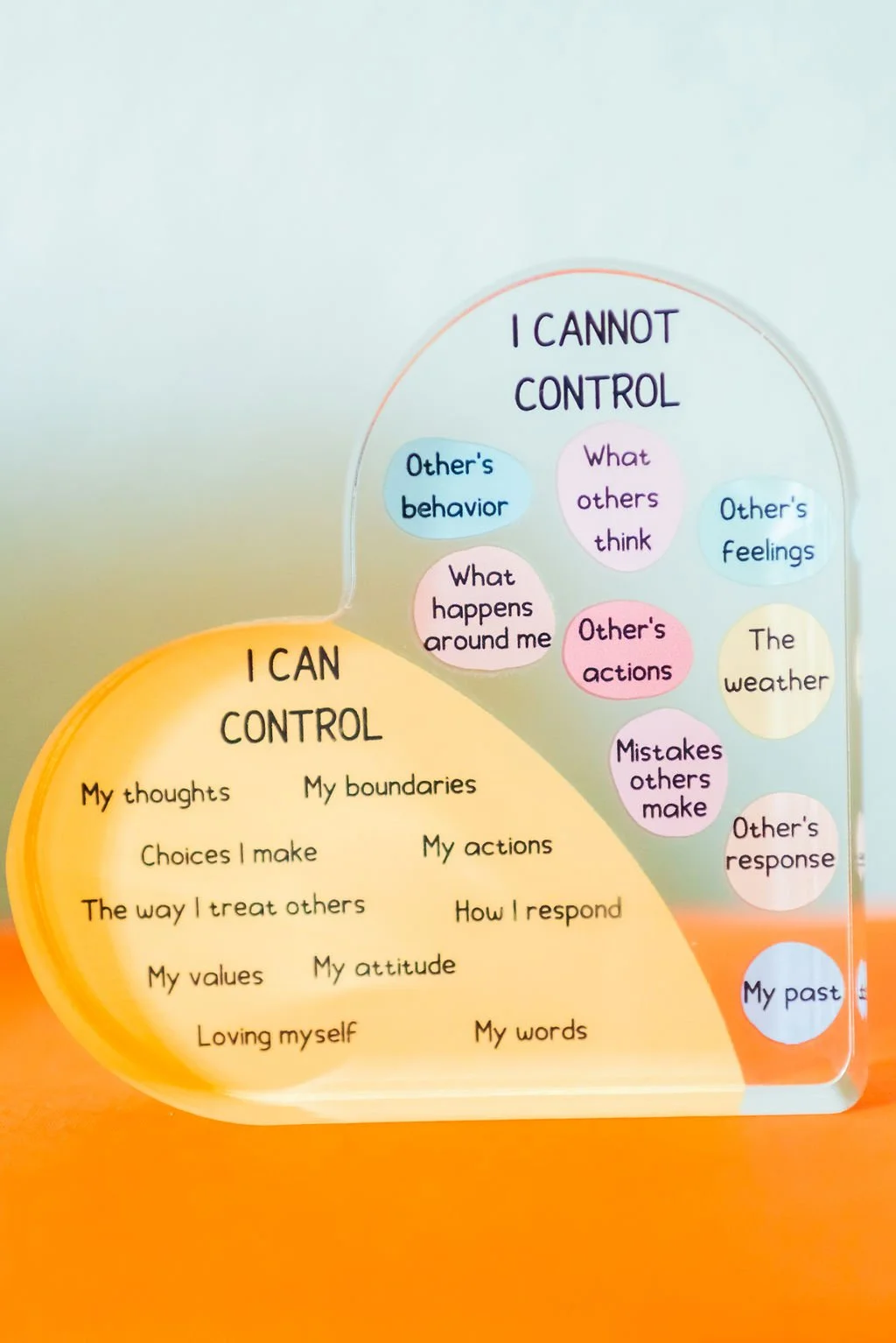Clear locus of control desk decoration in a Texas therapy office showing what people can and cannot control, supporting anxiety counseling, stress management, emotional wellness, and virtual therapy for adults.