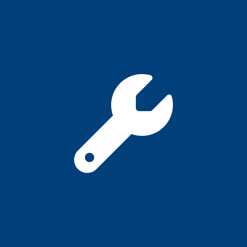 Icon of a white wrench on a blue background
